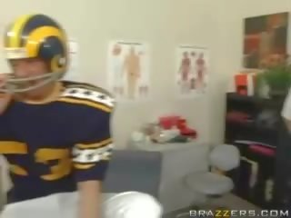 Slutty big breasted doctor shags with injured football player